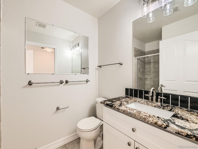 bathroom with visible vents, toilet, tile patterned flooring, vanity, and a shower stall