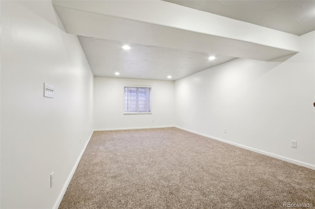 below grade area featuring recessed lighting, baseboards, and carpet floors