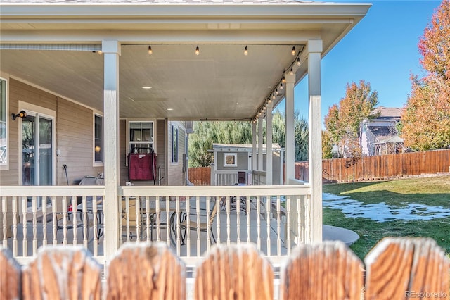 exterior space with a yard and a storage unit