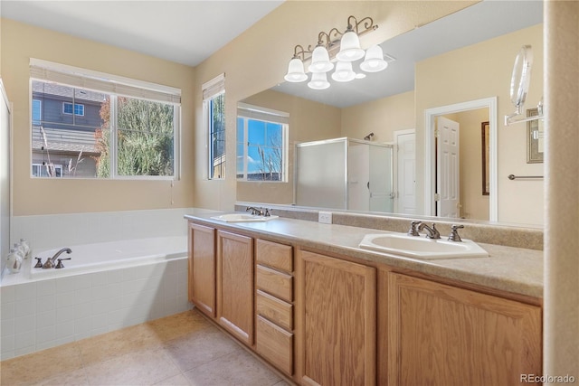 bathroom featuring tile patterned floors, vanity, and plus walk in shower