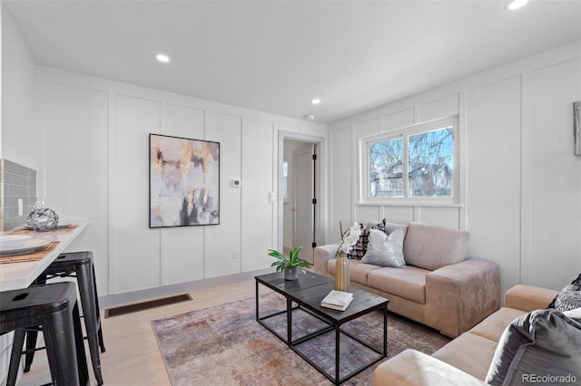 living room featuring light hardwood / wood-style flooring