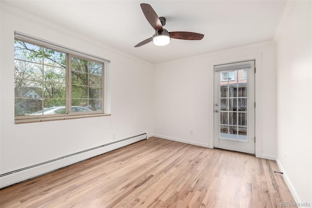 unfurnished room featuring crown molding, a baseboard radiator, and light wood finished floors