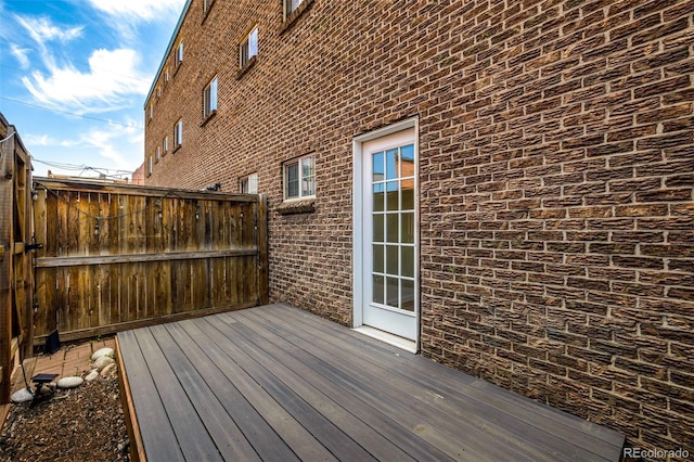 wooden deck featuring fence