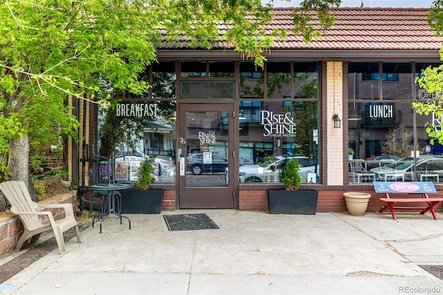 70 N Grant St Unit 10, Denver, CO 80203 - view of exterior entry featuring a tiled roof