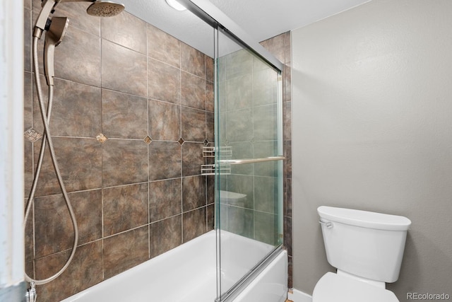 bathroom with toilet and enclosed tub / shower combo