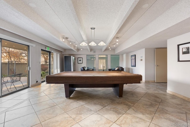 game room featuring beam ceiling, light tile patterned flooring, a textured ceiling, and pool table