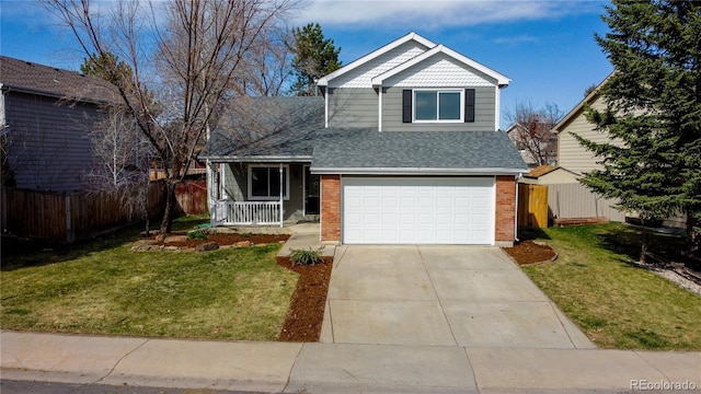 view of front of house featuring a garage and a front yard