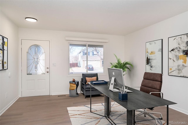 home office featuring hardwood / wood-style floors