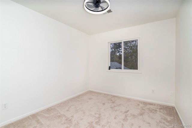 empty room with carpet flooring