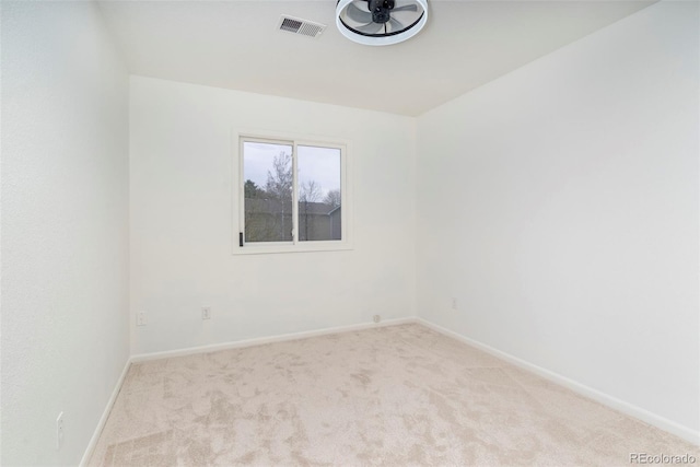 unfurnished room featuring carpet flooring