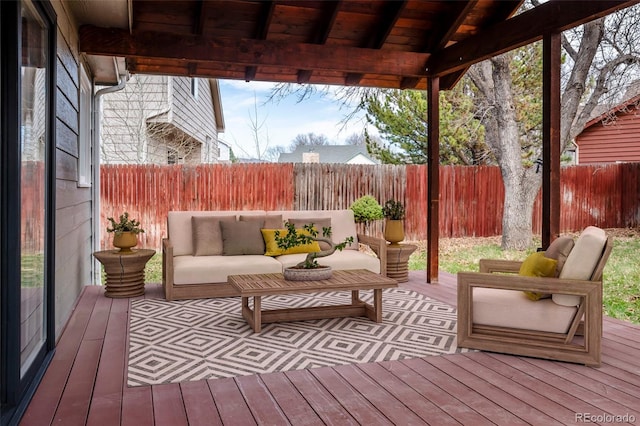 wooden terrace featuring an outdoor hangout area