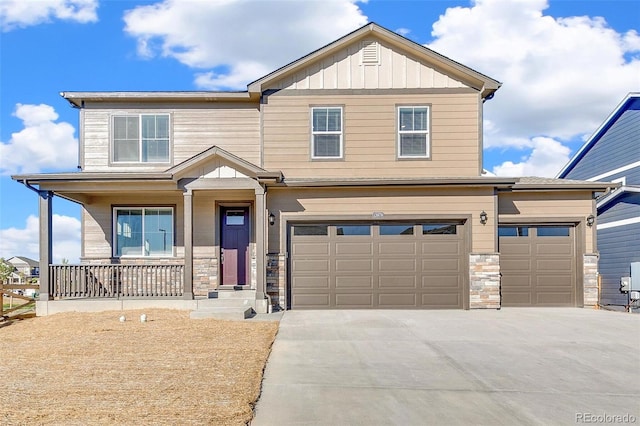 18358 Field Mint Pt, Parker, CO 80134 - craftsman-style home featuring driveway, stone siding, covered porch, an attached garage, and board and batten siding