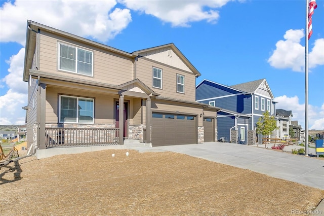 18358 Field Mint Pt, Parker, CO 80134 - craftsman-style house with an attached garage, a porch, stone siding, and concrete driveway