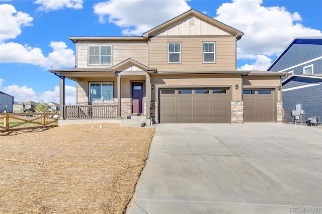 18358 Field Mint Pt, Parker, CO 80134 - craftsman-style home featuring driveway, board and batten siding, covered porch, fence, and a garage