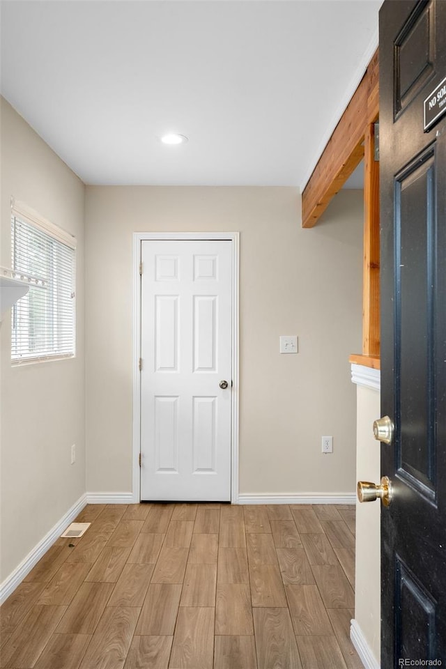 1264 Uinta St, Denver, CO 80220 - entrance foyer featuring wood finished floors, baseboards, and recessed lighting