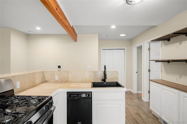 1264 Uinta St, Denver, CO 80220 - kitchen with black appliances, a sink, open shelves, white cabinetry, and recessed lighting
