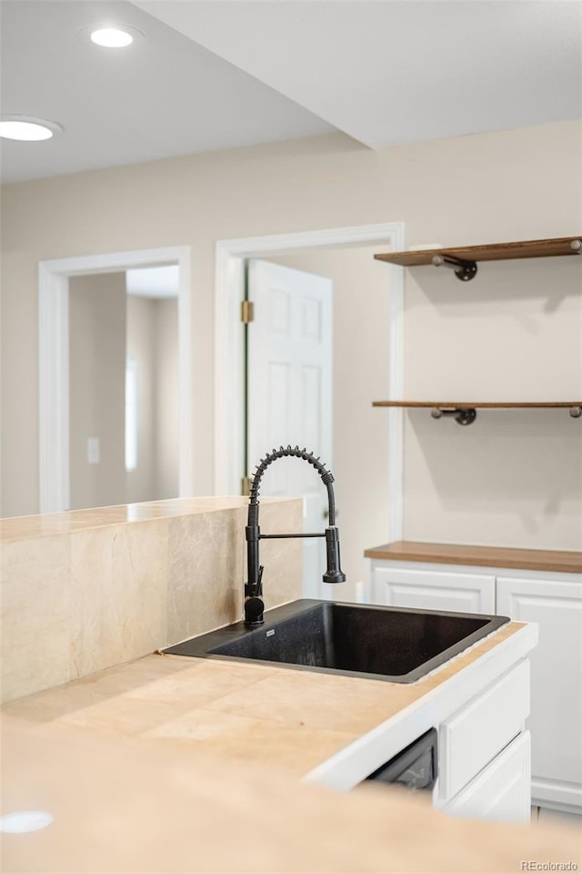 1264 Uinta St, Denver, CO 80220 - kitchen with a sink, white cabinets, light countertops, recessed lighting, and open shelves