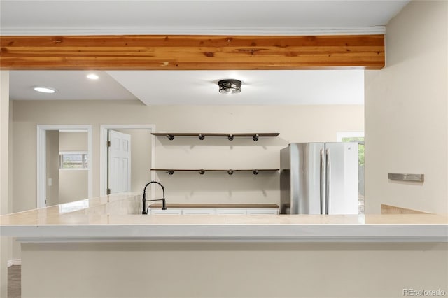 1264 Uinta St, Denver, CO 80220 - kitchen with freestanding refrigerator, a sink, open shelves, and recessed lighting