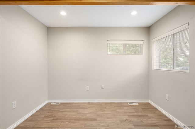 1264 Uinta St, Denver, CO 80220 - empty room with light wood finished floors, recessed lighting, and baseboards
