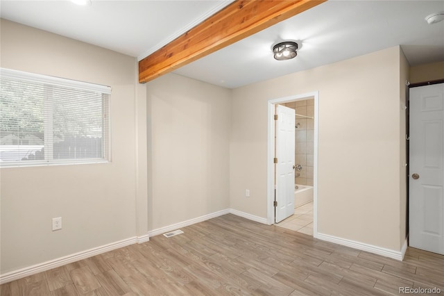1264 Uinta St, Denver, CO 80220 - spare room featuring light wood finished floors, baseboards, and a smoke detector