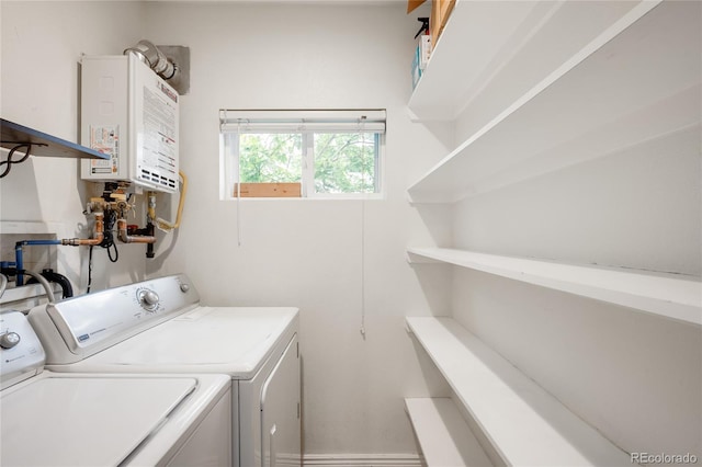 1264 Uinta St, Denver, CO 80220 - washroom featuring separate washer and dryer and tankless water heater