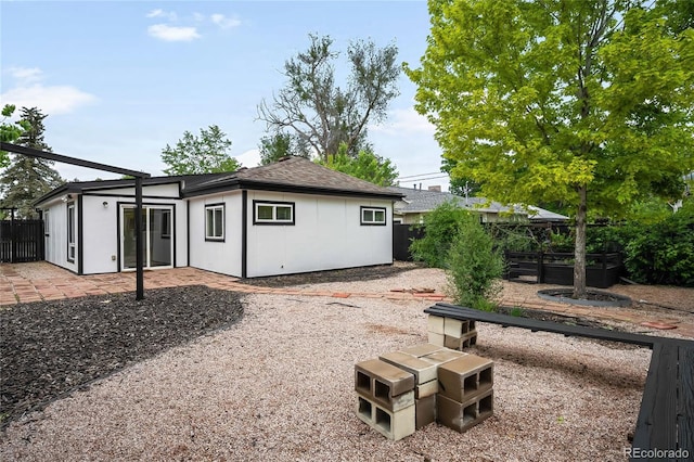 1264 Uinta St, Denver, CO 80220 - back of house featuring a patio area