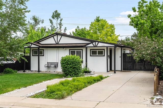 1264 Uinta St, Denver, CO 80220 - view of front facade featuring stucco siding