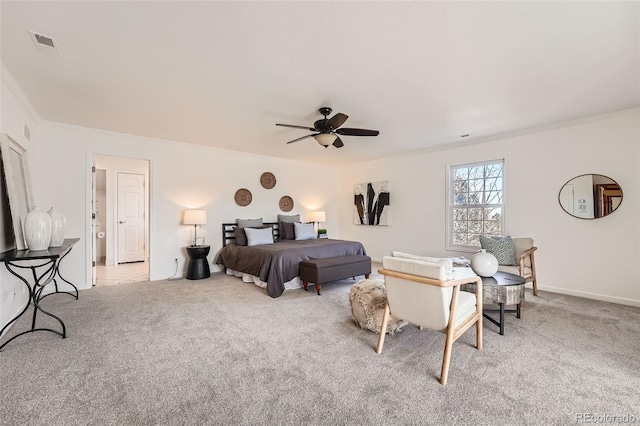 carpeted bedroom with crown molding, a ceiling fan, visible vents, and baseboards