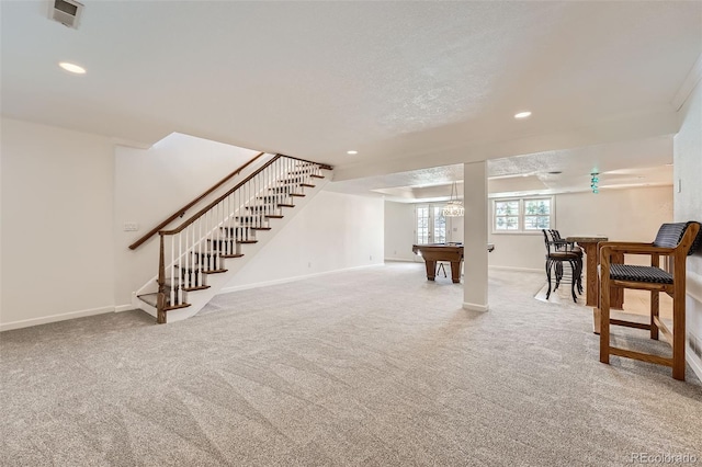 interior space featuring recessed lighting, baseboards, visible vents, and carpet floors