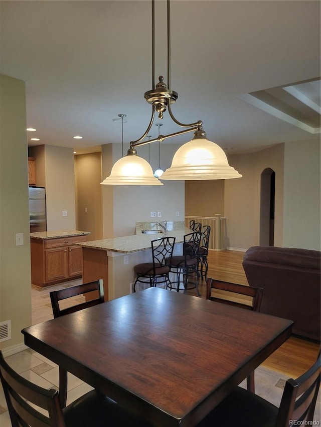 dining room featuring light hardwood / wood-style floors