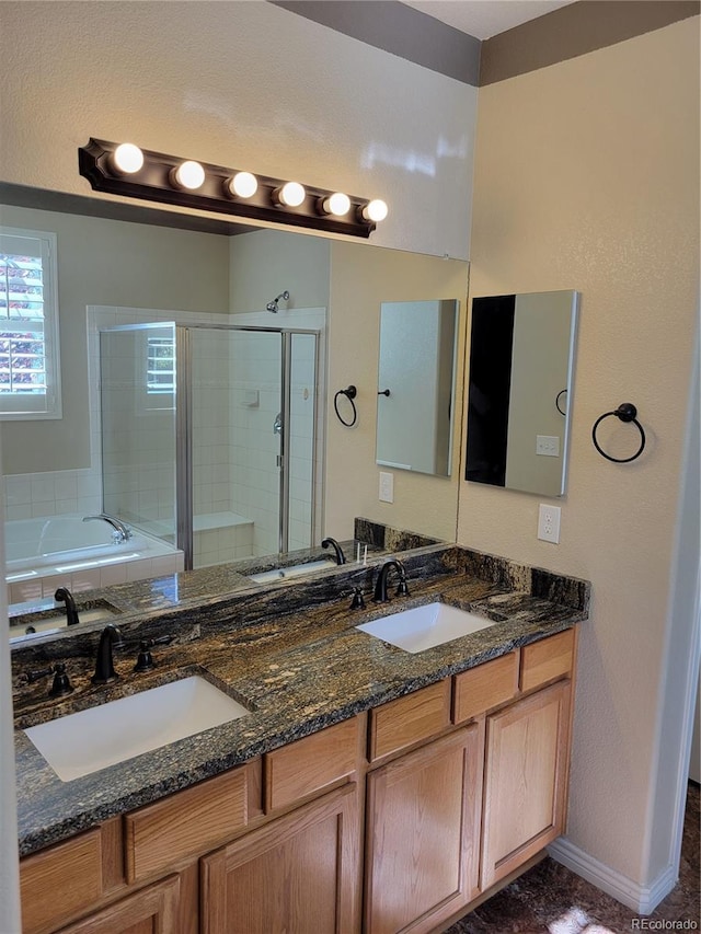 bathroom featuring vanity and plus walk in shower