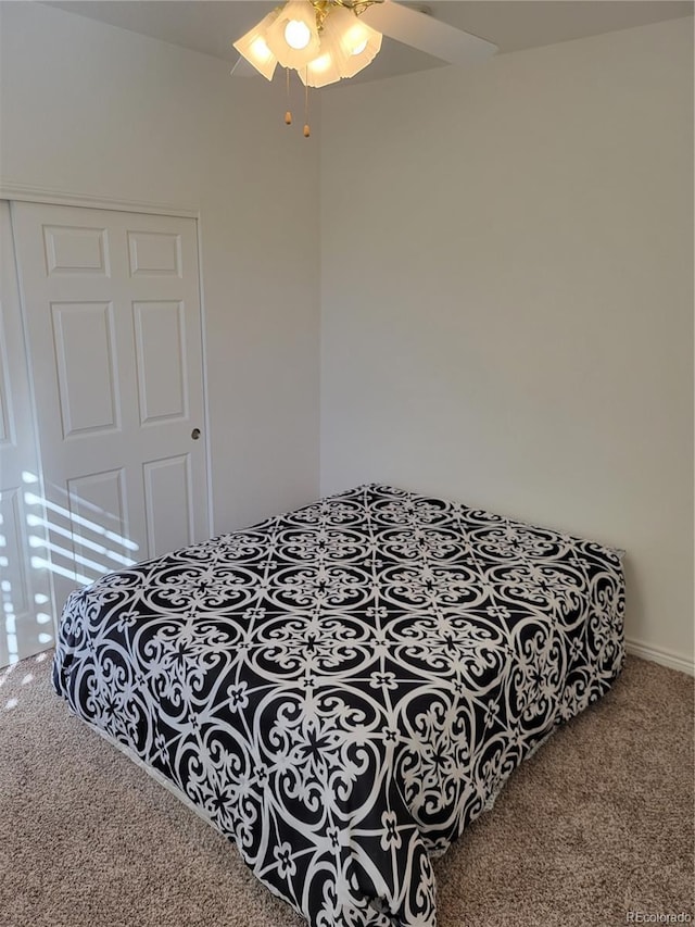 bedroom featuring carpet flooring and ceiling fan