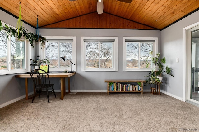 sunroom with carpet, vaulted ceiling, and plenty of natural light