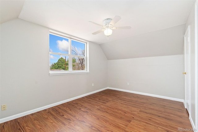 3270 W 92nd Pl, Westminster, CO 80031 - additional living space with lofted ceiling, baseboards, wood finished floors, and a ceiling fan