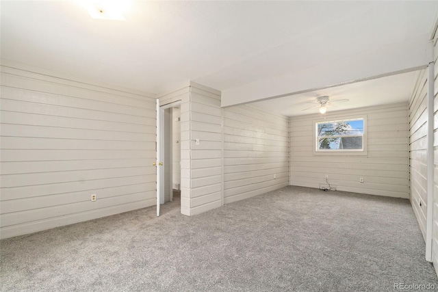 3270 W 92nd Pl, Westminster, CO 80031 - empty room featuring carpet, a ceiling fan, and wooden walls