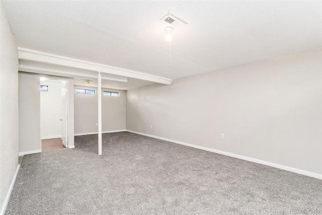 3270 W 92nd Pl, Westminster, CO 80031 - below grade area with carpet, baseboards, and a textured ceiling
