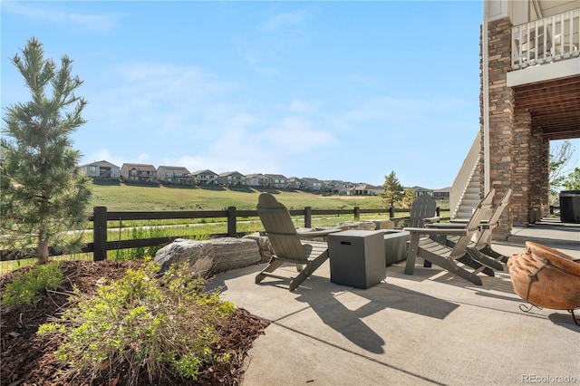 8691 S Sicily Ct, Aurora, CO 80016 - view of patio / terrace with an outdoor fire pit