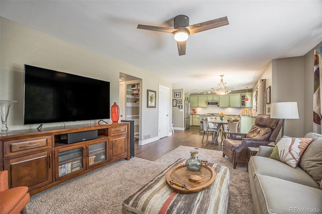 9200 W Indore Dr, Littleton, CO 80128 - living area featuring a ceiling fan and dark wood-style floors