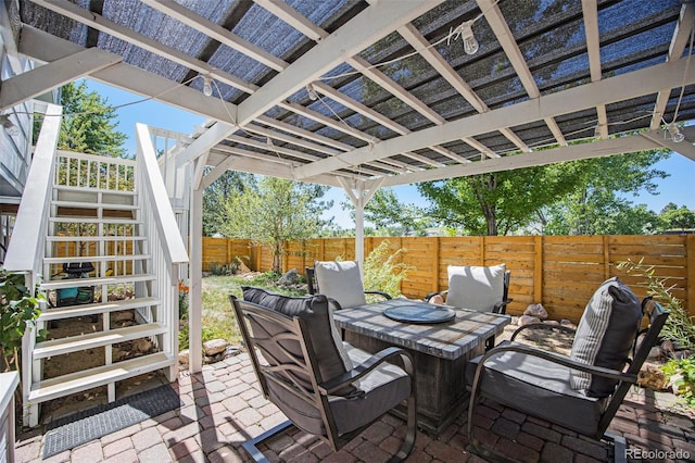 9200 W Indore Dr, Littleton, CO 80128 - fenced backyard with stairway, a patio area, and a pergola