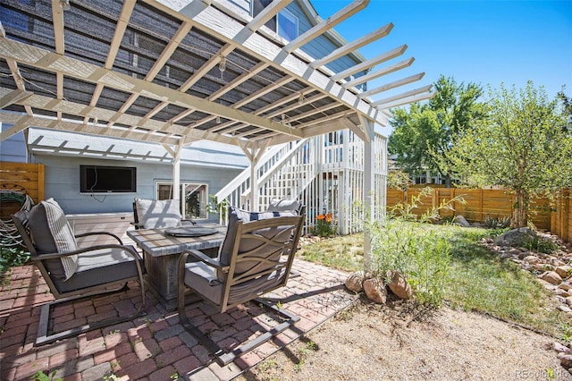 9200 W Indore Dr, Littleton, CO 80128 - view of patio with a pergola, outdoor dining space, and stairs