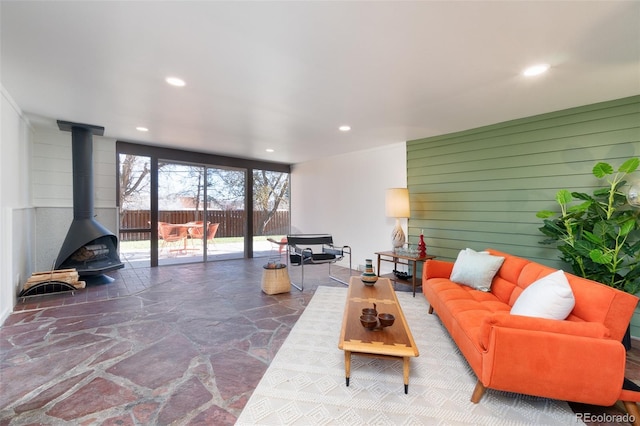 living room featuring a wood stove