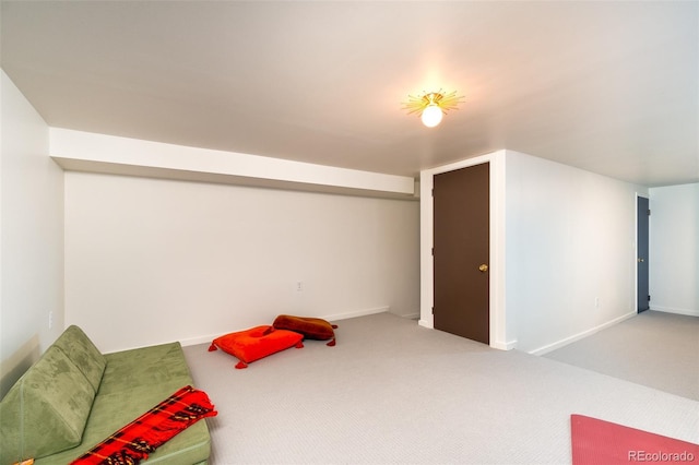 sitting room with carpet flooring