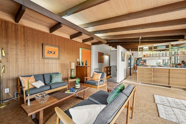 5450 Mohawk Rd, Littleton, CO 80123 - living room featuring beam ceiling and light carpet
