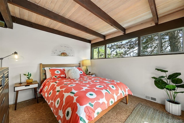 5450 Mohawk Rd, Littleton, CO 80123 - bedroom with beam ceiling, carpet flooring, baseboards, and wood ceiling