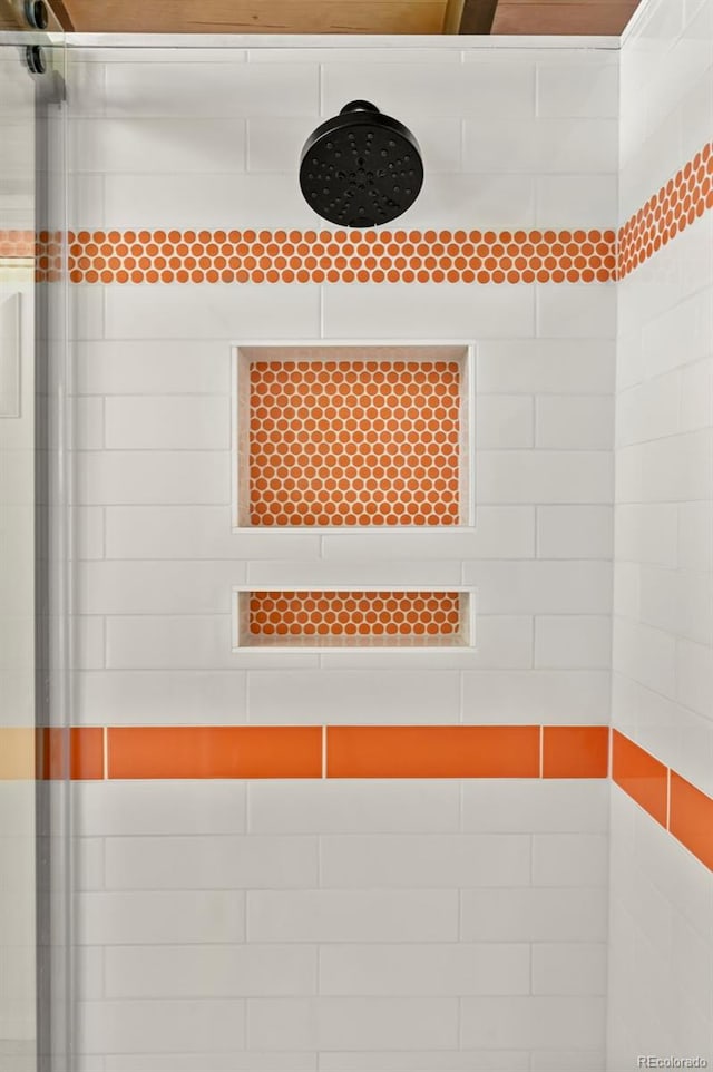 5450 Mohawk Rd, Littleton, CO 80123 - full bathroom featuring a tile shower