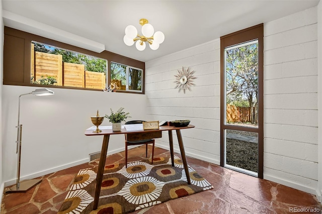 5450 Mohawk Rd, Littleton, CO 80123 - office space with plenty of natural light, a chandelier, and baseboards