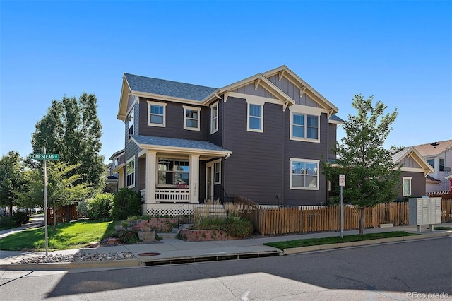 craftsman-style home featuring covered porch