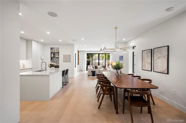 332 S Franklin St, Denver, CO 80209 - dining room featuring light wood-style flooring and recessed lighting