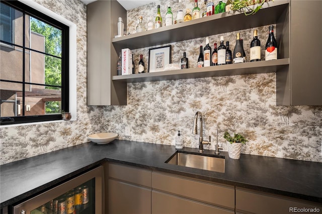 332 S Franklin St, Denver, CO 80209 - indoor wet bar featuring wine cooler and tasteful backsplash
