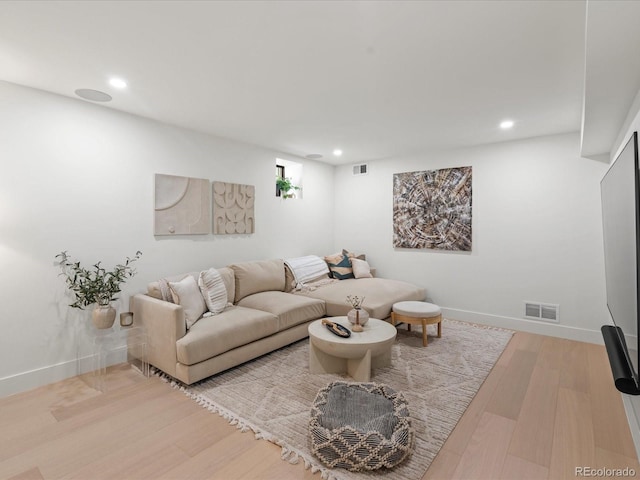332 S Franklin St, Denver, CO 80209 - living room with recessed lighting and wood finished floors